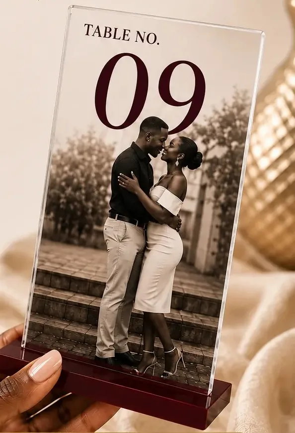 Acrylic table number stand printed with a couple's photo